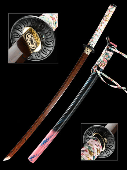 The hand-forged blade is crafted from pattern-welded steel, hammered and forged through countless strikes