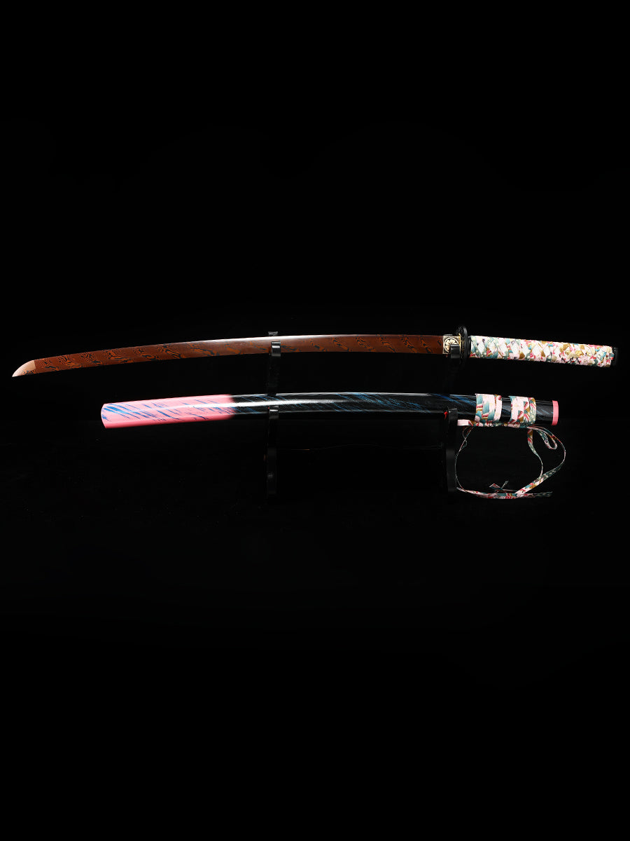 The hand-forged blade is crafted from pattern-welded steel, hammered and forged through countless strikes
