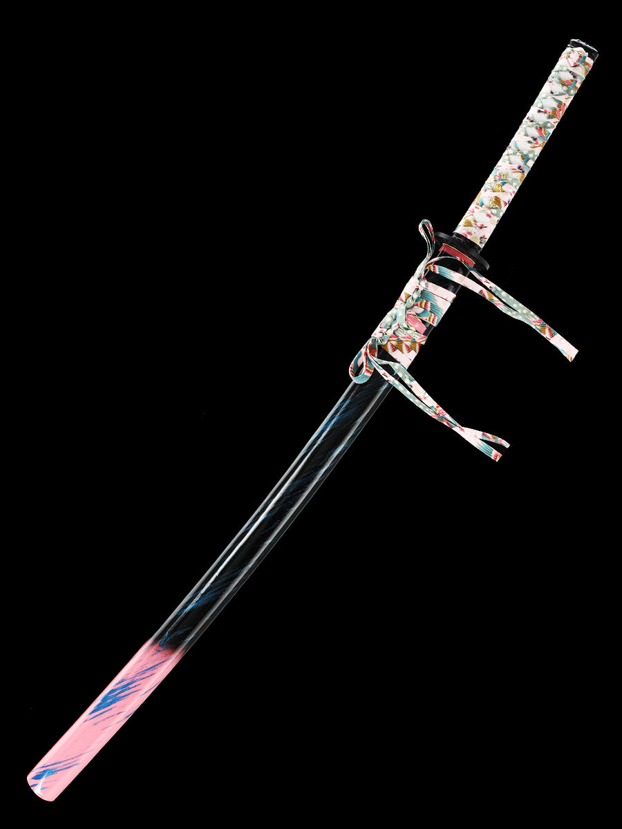 The hand-forged blade is crafted from pattern-welded steel, hammered and forged through countless strikes